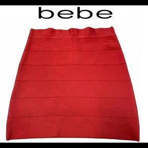BEBE coral pink bandage mini skirt size medium